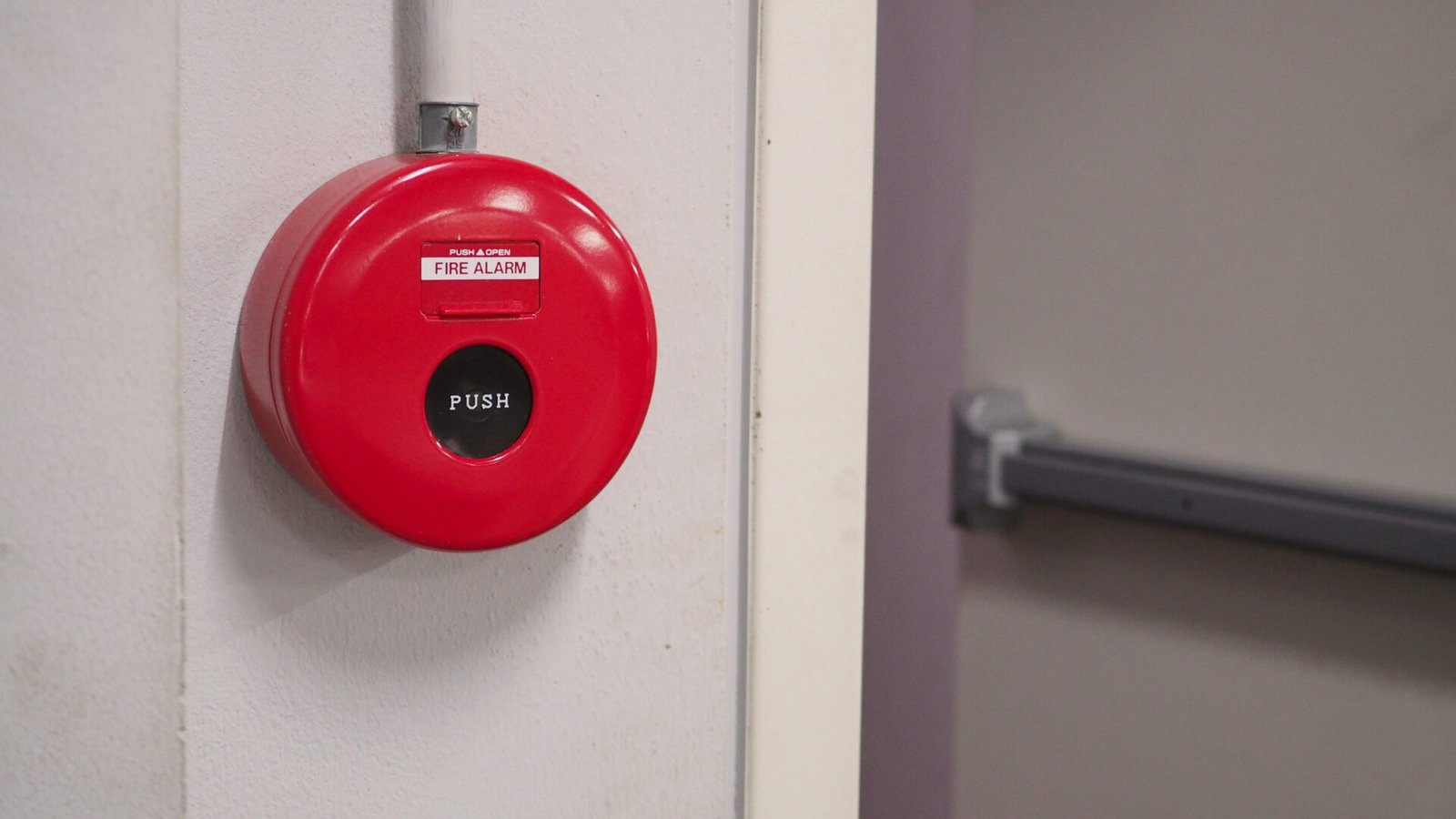Fire alarm beside exit door